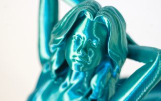 Siren printed from PLA Rainbow Silk Ocean filament